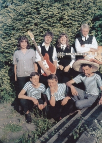 Zdeněk Bartl (sitting on the stairs) with other members of the school theatre band, 1965