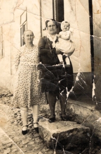 Grandmother Albína with sister Marie cradling the witness's mother, 1932