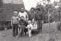 Old woman Anna Váňová - grandmother with grandchildren