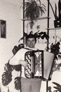 Oldrich Lovecek with harmonica, ca. 1970s