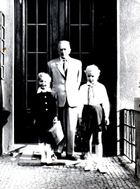 As a Pioneer member (right with scarf) with her grandfather and younger sister