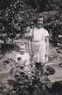 Tomáš Bergmann with his sister Ivona in the garden in Košíře
