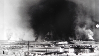 Burning Kbely airfield viewed from Hloubětín after an air raid of 16 April 1945