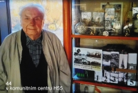Jan Břinek with his Hloubětín Chronicle at the H55 Community Centre, 2023