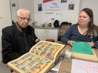 Browsing documents and reminiscing with daughter Magdalena, 2 April 2025