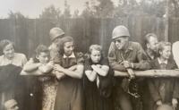 A group of young people, including Sylva Trnková and George Salesky (in helmet on the right)