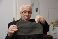 With Colonel Luboš Hruška's prison hat that he gave him in remembrance