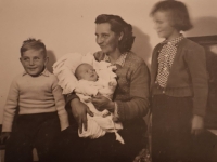 Antonín Křoustek as a baby with his mother and siblings