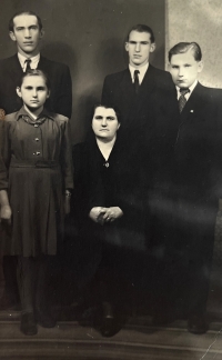 Hana Hrdinová with her family, front side of a postcard sent to Jan Ursíny in prison, 1950