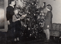 The Jirman siblings by the Christmas tree, the eldest Jaroslav is standing on the left