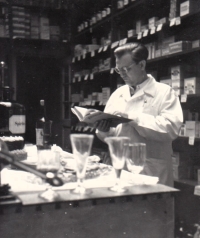 Jaroslav Jirman, the father of the witness, in the pharmacy in Trutnov in the 1950s