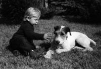 Jiří Růžička in his childhood with his dog Alík