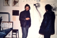 Installing a collective exhibition at the culture centre in Kamenná kolonie in Brno. Ivo and Josef Daněk, with Ivo drawing on the wall. 1987