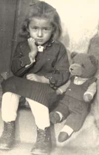 Marie Pražáková with the teddy bear she could take from her family home