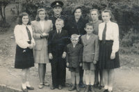 Family of Vladimír Suk and his aunt Javorská in 1948. Vladimír Suk is the smallest boy standing in the front.