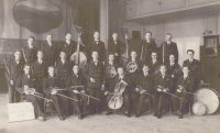 Father played several wind instruments in a band in Bernartice (middle row, far left), 1932