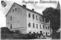 School in Štěpánkovice in a period postcard