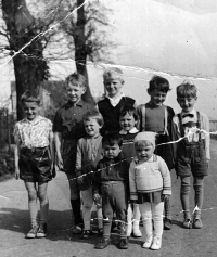 Vilém Lasák's son Jiří (left), son Vilém (bottom centre), and daughter Irena (with collars)