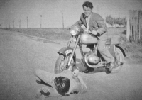 Vilém Lasák on the ground, with friend Jan Nevřela on the motorcycle