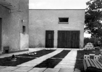 Garage in place of the barn that was hit by an artillery shell in April 1945