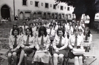 As a student with her classmates in Vlašský dvůr in Youth Union uniforms before the handing over of graduation certificates, 1976