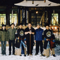 Josef Mádl (third from left) with a group of stuntmen during the recording of Shangai Knights with Jackie Chan, Barrandov 2002