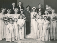 Lubomíra Racková (small girl below, first from right) at the wedding of her cousin Jan Holeček, 1946