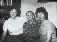 With her mother and sister