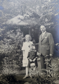 Radmila Janíčková (left) with her father and sister as a child