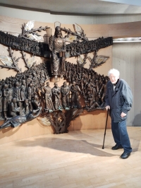 František Lipenský at the original bronze altar in the Alt-Katholische Pfarrgemeinde Christi Auferstehung, where he immortalised himself, 2023