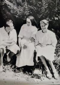 With a colleague and a nun