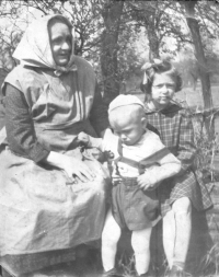 Bohumil Pelc with his grandmother and sister, 1957