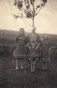 Berta, Sophie's mother with her brother Josef and Anna Plobner in the garden of their house in Wittigstal