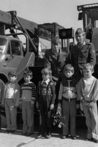 Witness (top right) at the military service, 1980