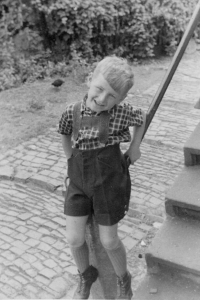 Josef Urban at the staircase of the house in Čajkovského Street, wartime