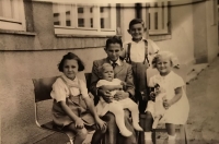 Left to right: Eva, Antonín and Milan Vybírals; front row: cousin Jana (right), Lipník nad Bečvou