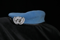 The iconic blue beret in which the witness served in Yugoslavia