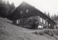 The cottage in the mountains where the witness lived before she got married