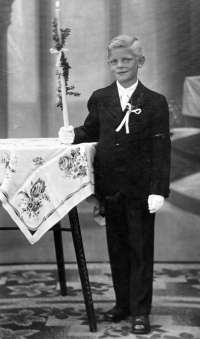 Josef Hackenberg on the day of his confirmation in a church in Vrbno pod Pradědem, early 1940s