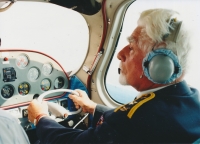 František Fajtl piloting a plane on the occasion of his 85th birthday, 1997