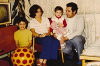 Regina Loukotová (with teddy bear in her arms) with her parents and brother, 1972