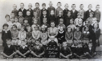Cecílie Urbancová among other children in a group school photo of the 1st class in Zohor in the school year 1937/1938
