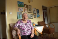 Cecílie Urbancová in her home environment with the creations of her former pupils and her descendants