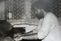 Petr Hromadka playing harmonium, 1985