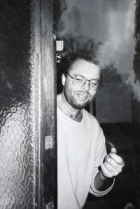 Petr Hromádka in front of his flat, 1989