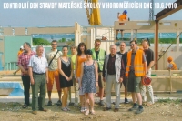 Václav Kášek (fourth from left) during the construction of a kindergarten in Horoměřice in 2010