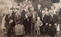 My sister's wedding. Father in the bottom row second from the right, mother sixth from the right, 1944