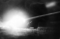 A photo of a flash taken during a rocket launcher exercise