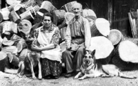Grandmother and grandfather in the yard of their house in Vrbno od Pradědem