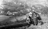 Grandmother Anna Galušková with a scarf in the landscape above Vrbno pod Pradědem, 1950s